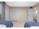 Spacious bedroom with carpet and large closet with bi-fold doors at 446 Alberta Dr, Winter Park, FL 32789