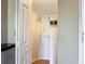 Efficient closet with shelving, bars, and a built-in safe for secure storage, maximizing space and organization at 448 Warrior Trl, Deltona, FL 32725