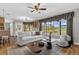 Bright living room with hardwood flooring and an outside view at 448 Warrior Trl, Deltona, FL 32725