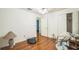 Bedroom featuring wood floors, a ceiling fan, closet, and natural light at 4799 Lighthouse Rd, Orlando, FL 32808