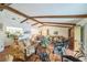 Bright and airy living room with hardwood floors and a view into the kitchen at 4799 Lighthouse Rd, Orlando, FL 32808