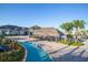 Aerial view of the lazy river, tiki bar, and community buildings creating a resort-style experience at 4802 Lullaby Ln, Kissimmee, FL 34746