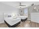 Charming bedroom featuring two twin beds, playful decor, and a serene atmosphere at 4802 Lullaby Ln, Kissimmee, FL 34746