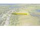 Expansive vacant lot in a lush, green neighborhood near a lake, perfect for building a dream home at 4951 Parkview Dr, St Cloud, FL 34771
