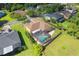 An aerial view of the home shows a private screened pool and a large backyard at 4951 Parkview Dr, St Cloud, FL 34771