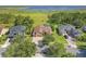 An aerial view of the beautiful home near a lake surrounded by lush green landscape at 4951 Parkview Dr, St Cloud, FL 34771