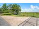 Spacious backyard with a paver patio, lawn and a view of a lake at 4951 Parkview Dr, St Cloud, FL 34771