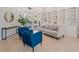 Cozy living room featuring built-in bookshelves, comfortable seating, and access to outdoor pool area at 4951 Parkview Dr, St Cloud, FL 34771
