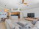 Open concept living area featuring living room and partial view of eat-in kitchen at 4951 Parkview Dr, St Cloud, FL 34771