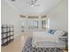 Bright main bedroom with tile flooring and an exterior door at 4951 Parkview Dr, St Cloud, FL 34771