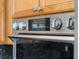 Close up shot of a modern, stainless steel oven with digital display at 4951 Parkview Dr, St Cloud, FL 34771