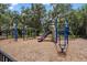 Community playground featuring various play structures, climbing frames, and slides at 4951 Parkview Dr, St Cloud, FL 34771
