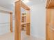 Custom walk-in closet with wood shelving and built-in organization system at 4951 Parkview Dr, St Cloud, FL 34771