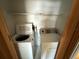 A laundry area featuring a washing machine and dryer, offering in-unit convenience at 5564 Slash Pine Ct # 4, Orlando, FL 32811