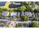 Overhead view showing the community's pool area, buildings, landscaping, and parking facilities at 6029 Westgate Dr # 726, Orlando, FL 32835