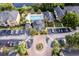 An aerial view of the community with a swimming pool, clubhouse, and parking at 6029 Westgate Dr # 726, Orlando, FL 32835