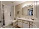 A full bathroom featuring a shower-tub combination, toilet, vanity and framed mirror at 6029 Westgate Dr # 726, Orlando, FL 32835