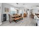 Dining Room featuring hardwood floors, bench and view into living room at 640 Bayern Ln, Debary, FL 32713