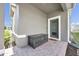 Charming front porch features a storage bench on a brick paver surface and a welcoming entrance at 640 Bayern Ln, Debary, FL 32713