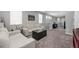 Upstairs loft featuring neutral walls, a large couch, and plenty of natural light at 640 Bayern Ln, Debary, FL 32713