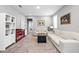 Upstairs loft featuring neutral walls, a large couch, and plenty of natural light at 640 Bayern Ln, Debary, FL 32713