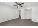 Spacious bedroom featuring a ceiling fan, recessed lighting and a walk-in closet at 654 Ne 130Th Ct, Silver Springs, FL 34488