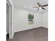 Bedroom featuring a ceiling fan, recessed lighting, and window at 654 Ne 130Th Ct, Silver Springs, FL 34488
