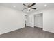 Spacious bedroom featuring a ceiling fan, recessed lighting and a walk-in closet at 654 Ne 130Th Ct, Silver Springs, FL 34488