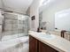 Clean bathroom with a shower-tub combo, vanity with storage, and modern finishes at 725 Ashworth Overlook Dr # C, Apopka, FL 32712