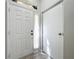 Bright entryway featuring a white interior door with glass panel and decorative accents at 725 Ashworth Overlook Dr # C, Apopka, FL 32712