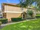 Two-story home with a well-manicured lawn and an inviting front entrance at 725 Ashworth Overlook Dr # C, Apopka, FL 32712