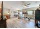Open-concept living room flows into dining area and kitchen for easy entertaining at 725 Ashworth Overlook Dr # C, Apopka, FL 32712