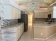 Spacious kitchen with ample cabinet and counter space featuring stainless steel appliances at 8012 Old Town Dr, Orlando, FL 32819