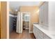 Bathroom with wood look flooring, a walk in shower, and a white vanity at 849 Bentley Green Cir, Winter Springs, FL 32708