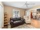 Bonus room with hardwood floors, a ceiling fan, and comfortable furnishings at 849 Bentley Green Cir, Winter Springs, FL 32708