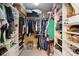 Walk in closet featuring plenty of storage and including a personal safe at 849 Bentley Green Cir, Winter Springs, FL 32708