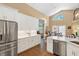 Spacious kitchen featuring stainless steel appliances, and ample storage space at 849 Bentley Green Cir, Winter Springs, FL 32708