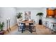 Modern dining area with seating for six, stylish decor, and an open concept design at 901 E Pine St # 2, Orlando, FL 32801