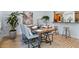 Stylish dining room with contemporary furniture, modern decor, and an open view to the kitchen at 901 E Pine St # 2, Orlando, FL 32801