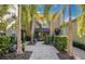 Charming townhouse with well-manicured landscaping, a private entrance, and a paved walkway at 901 E Pine St # 2, Orlando, FL 32801
