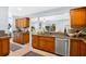 Open kitchen features modern stainless appliances and views to an adjacent living room at 901 E Pine St # 2, Orlando, FL 32801