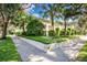 Professionally landscaped corner lot with lush greenery and mature trees at 901 E Pine St # 2, Orlando, FL 32801