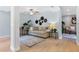 Comfortable living room showcasing neutral tones, stylish decor, and wood flooring at 901 E Pine St # 2, Orlando, FL 32801