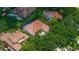 Birds-eye view of luxurious homes featuring screened enclosures and meticulous landscaping at 9142 Southern Breeze Dr, Orlando, FL 32836