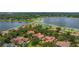 Picturesque aerial shot showcases waterfront homes nestled among trees with private lake access at 9142 Southern Breeze Dr, Orlando, FL 32836