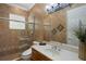 A bathroom featuring tiled walls, a glass-enclosed shower, and a modern vanity at 9142 Southern Breeze Dr, Orlando, FL 32836