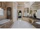 Spacious bathroom with soaking tub, vanity with granite countertops, and decorative tile work at 9142 Southern Breeze Dr, Orlando, FL 32836