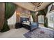 Luxurious main bedroom with custom ceiling, designer rug and custom window treatments at 9142 Southern Breeze Dr, Orlando, FL 32836