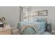 Bright bedroom with a large window and hardwood flooring at 9319 Marsh Oaks Ct, Orlando, FL 32832