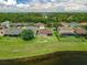 This property offers prime waterfront access, nestled among neighboring homes and lush greenery at 10151 Chorlton Cir, Orlando, FL 32832